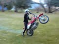 Chaz doing wheelies again on lawn