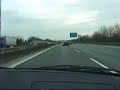 BMW M3 racing an Audi RS4 on the autobahn