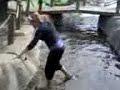 kendra falling into a mini golf water trap