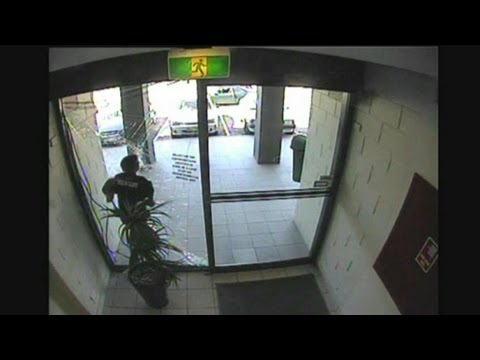 WATCH: Bag snatcher crashes through glass then escapes