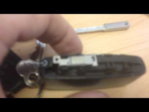 How to put battery in Range Rover sport key fob