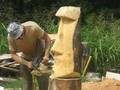 chainsaw carving Moai, tiki head, arborist, tree climber