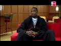 Dikembe Mutombo on his blocks