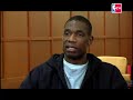 Dikembe Mutombo on his blocks