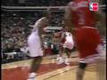 Dikembe Mutombo on his blocks