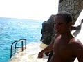 Rick's Cafe, Negril, Jamaica. Local boy diver says some land on their back and they call an ambulance. He claims that many tourists jump and some get injured but it's not too risky if they know how to do it. This boy talks about a man who came from a boat and probably died. Perhaps he's talking about the man mentioned on tripadvisor.com http://www.tripadvisor.com/ShowUserReviews-g147313-d149415-r4165277-Rick_s_Cafe-Negril_Jamaica.html The person who writes about this experience is surprised Rick's Café had no backboard to offer. I had the same surprise when I personally suffered a broken spine and sternum. There are many others who have suffered injuries and there are claims of death. Read my story: http://www.rickscafenegril.com