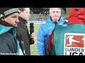 Wolfgang Loos und Petrik Sander vor dem Spiel gegen 1860 München