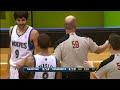 Michael Beasley gets to know his rookie teammate and grabs some of Ricky Rubio's hair after a miscommunication on the court.