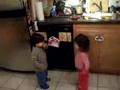Emmi and David do a tushie dance