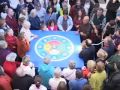 Losang Samten sandpaints the Mandala at Colby College in Waterville, Maine