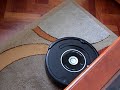 Roomba 581 limpiando la alfombra