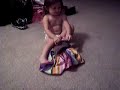 Jossy trying to dress herself Jossy trying to dress herself