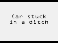 car stuck in ditch