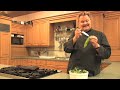 learn to make chile rellenos in this video, the first of a series hosted by chef john vollertsen. see the video and tell a friend.


chile rellenos
(serves 6)

8 ounces cold sharp cheddar cheese
6 large whole new mexico green chiles, roasted and peeled
1 batch beer or blue corn-buttermilk batter (recipes follow)
3 cups vegetable oil for frying
1 batch red chile sauce (recipe follows)
optional: sprigs of fresh cilantro and sour cream or crema thinned slightly and poured into a squeeze bottle for decorating plates


cut cold cheese into matchstick-size pieces, 2 inches long by 1/8-inch square. cut a tiny slit toward the top of the roasted, peeled chile and carefully slide in pieces of the cheese until the chile is filled with cheese. (handle with care so you won't tear the chile.)

drain stuffed chiles on paper towels before dipping in batter. heat oil to 350 degrees. dip chiles, one at a time, into batter and carefully slide them into the hot oil, be careful not to overcrowd the pot. once they are golden brown, turn the chiles over and fry the other side. the second side will brown more quickly. keep warm in oven until all chiles are fried. drain fried chiles on paper towels.

make a pool of red chile sauce on each plate and top with a fried chile. if you like, you can use the sour cream to make a decorative squiggle on the red chile sauce, and top the relleno with a sprig of fresh cilantro.

***

beer batter
3/4 cup plus 2 teaspoons all-purpose flour
1/4 cup cornstarch
1/2 teaspoon salt
1/4 teaspoon ground cumin, toasted
1/4 teaspoon ground cayenne
1 cup beer, any brand as long as it's not dark

combine flour, cornstarch, salt, cumin and cayenne in medium bowl.

measure beer into tilted measuring cup to be sure you have 1 cup liquid under the foam. stir beer and foam into the bowl of dry ingredients and whisk batter until smooth.

allow batter to rest 20 minutes before using.

if a thinner batter is desired, add a small amount of additional beer.