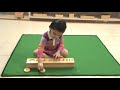 child with cylinder blocks