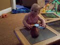 Meredyth playing on the coffee table Meredyth playing on the coffee table