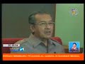 Mahathir dares government to charge him in court