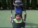 Swinging with mommy Swinging with mommy