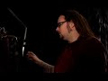 Jonathan Davis showing his kilts