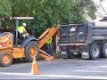 Backhoe digging a trench in Rancho Cordova, CA Backhoe digging a trench in Rancho Cordova, CA