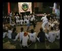 Contra Mestre Malicia playing during his workshop at Pisa in 2006 in a roda de capoeira angola.