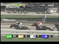 Announcer Larry Collmus calls the 7th at Monmouth Park