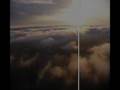 Above clouds in flexwing Microlight