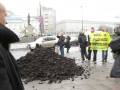 Coal dumped in front of coal polluters meeting in Poland