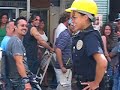 spoiler alert! michelle rodriguez tries her hand at traffic management in downtown honolulu during a break in shooting for abc's hit tv series 