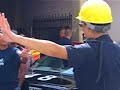 spoiler alert! michelle rodriguez tries her hand at traffic management in downtown honolulu during a break in shooting for abc's hit tv series 