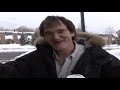 qt getting his cup of coffee and is annoyed by this paparazzi. he then lets the paparazzi know how he feels about that.

tarantino is awesome.
