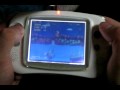 This is me playing the first level of Sonic The Hedgehog on the drmd Genesis emulator for GP32. I'm just doing this to show off how good the emulator is, not to state anything about my Sonic-playing skills. Oh, and that's grease from my Mini's engine compartment under my thumbnail.