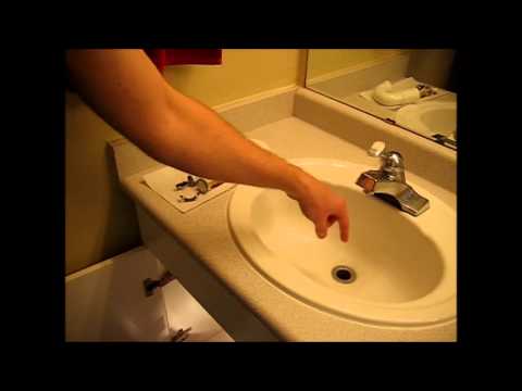 how to remove gunk from sink drain