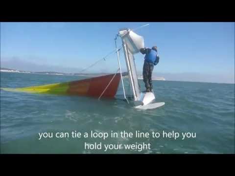 Righting an inverted catamaran 