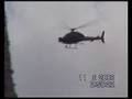 Black Helicopter & ufo in a field