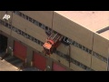 Raw Video: NY Dump Truck Crashes Through Wall