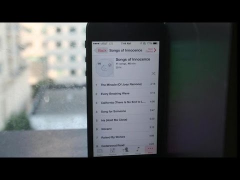 CNET Update - Apple's free album has some folks mad about U2