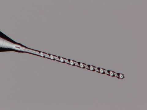 Makino Micro Drilling with 50 Micron Twist Drill