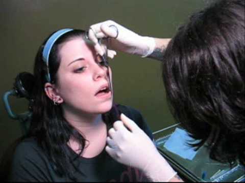Getting my lip pierced. My first non-ear piercing. Getting my lip pierced. My first non-ear piercing.