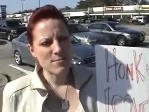 Cop Shoots Protester the Bird at Red Light Camera Protest
