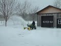 John Deere X300 with 44\" snowblower in action