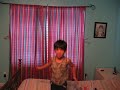 Kaef playing on the bed