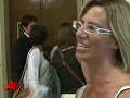 there were chaotic scenes at a courthouse in milan friday as fans and onlookers thronged to get a glimpse of movie star george clooney, there to testify in a fraud trial. (july 16)