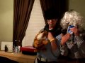 Sheldon and Santa (without beard) dance to poker face