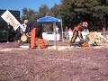 Mike Slingerland on the right with a super chainsaw...
