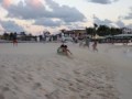 MD82 jet takes off, sandblasts people on beach