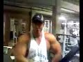 huge bodybuilder posing wwe wrestling stlye