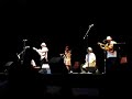 modesto nieves en guitarra acompa�ando a su hijo christian nieves tocando cuatro, monica en el guiro, raul maldonado y jovino gonzalez en san antonio, tx, noviembre 18, 2007. orquesta jibara celebrando el descubrimiento de la isla.
