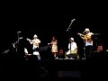 modesto nieves en guitarra acompa�ando a su hijo christian nieves tocando cuatro, monica en el guiro, raul maldonado y jovino gonzalez en san antonio, tx, noviembre 18, 2007. orquesta jibara celebrando el descubrimiento de la isla.