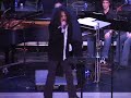 phil naro and don mancuso of d drive with the greece athena high school orchestra performing the doobie brothers' long train runnin'
